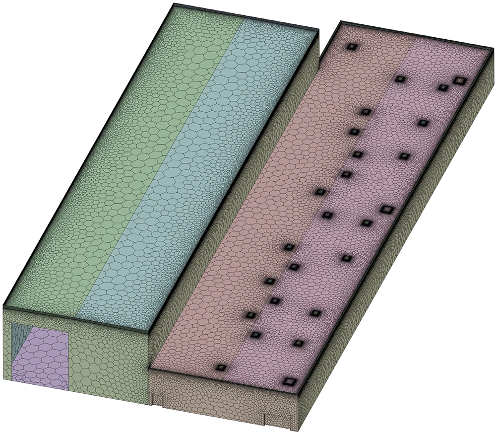 Isometric view of the polyhedral CFD mesh showing the tall terminal building next to the lower warehouse with roof windows